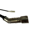 Detailed close-up view of the spark plug cap and resistive boot on the extremity of the high-tension lead.